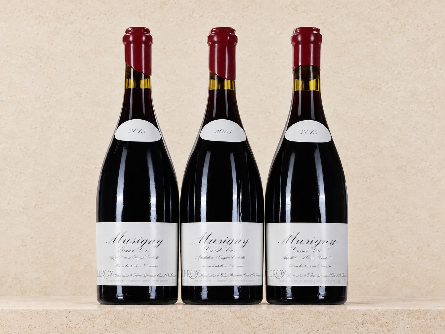Domaine Leroy Musigny Grand Cru 2015 75cl — trois bouteilles, vue de face